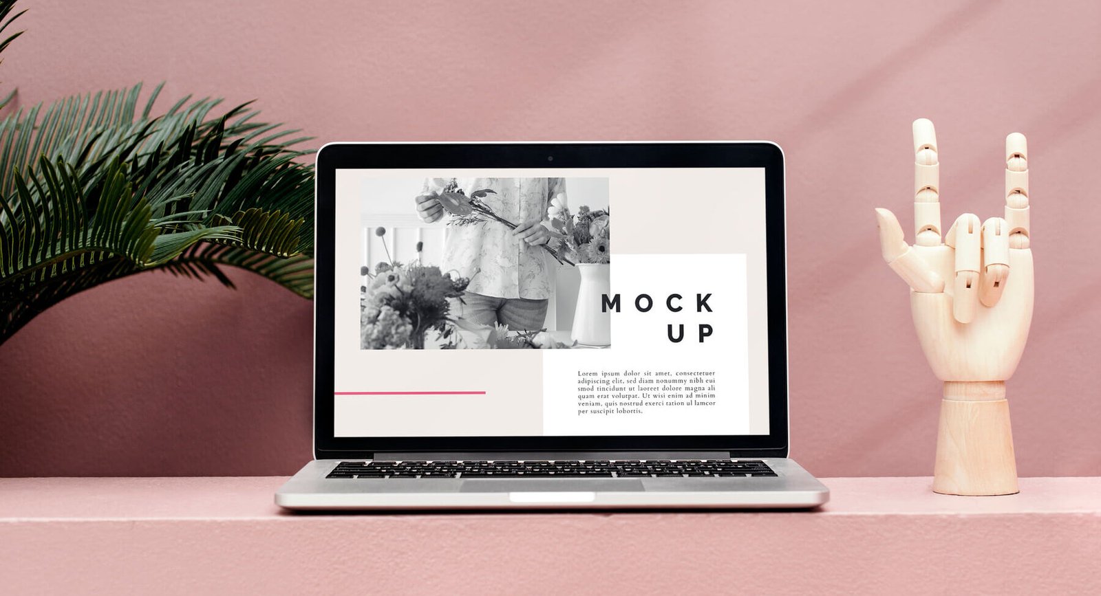 Notebook met een websiteontwerp op het scherm